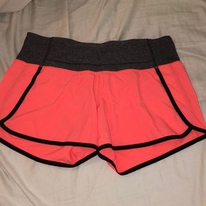 Neon orange lululemon shorts